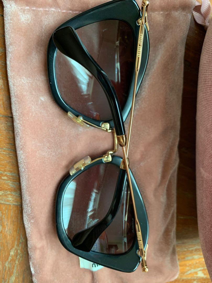 Miu miu sunglasses sales cat eye black