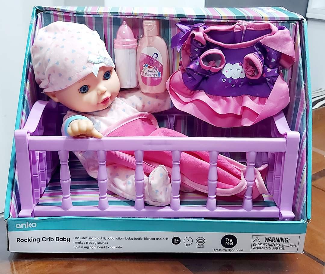 Dolls store rocking crib