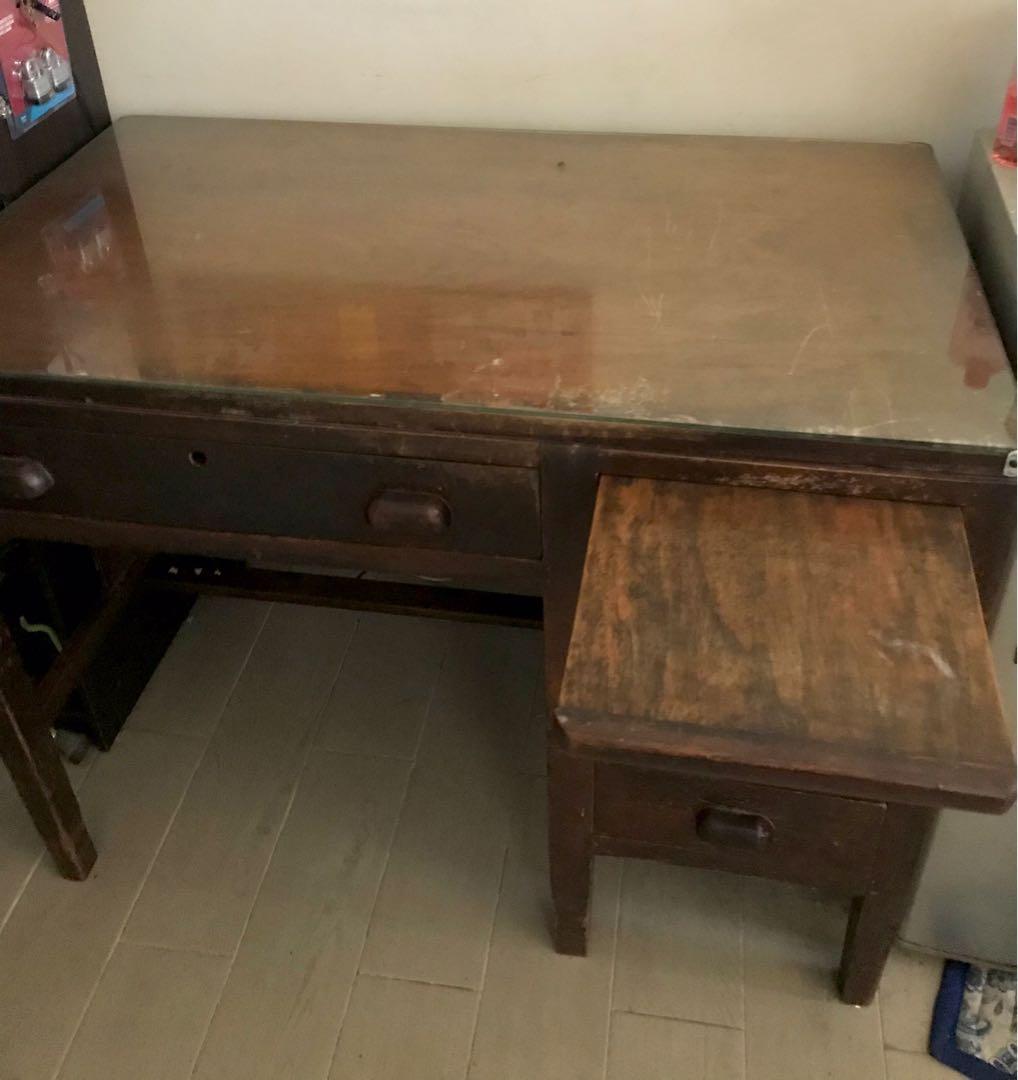 Antique desk (Category: Tables & Sets) located in Quezon City. Submitted by dobe2017 (Listing ID 1071773264, Image 3). Description: Vintage / Antique desk Made of Narra wood With glass top Width 23 inches Length 40 inches Height 32 inches No damage Item is from the 1930s .