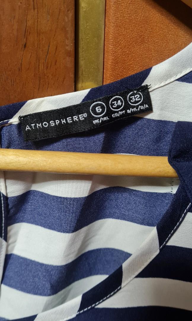 Atmosphere sleveless (Category: Others Tops) located in Pasig City. Submitted by xtnter (Listing ID 1071726319, Image 2). Description: Sorry ddnt iron my clothes 😁 just want to have a lil space in my cabinet. msg me if u want to know more bout the item. not really good on describing them.😊.