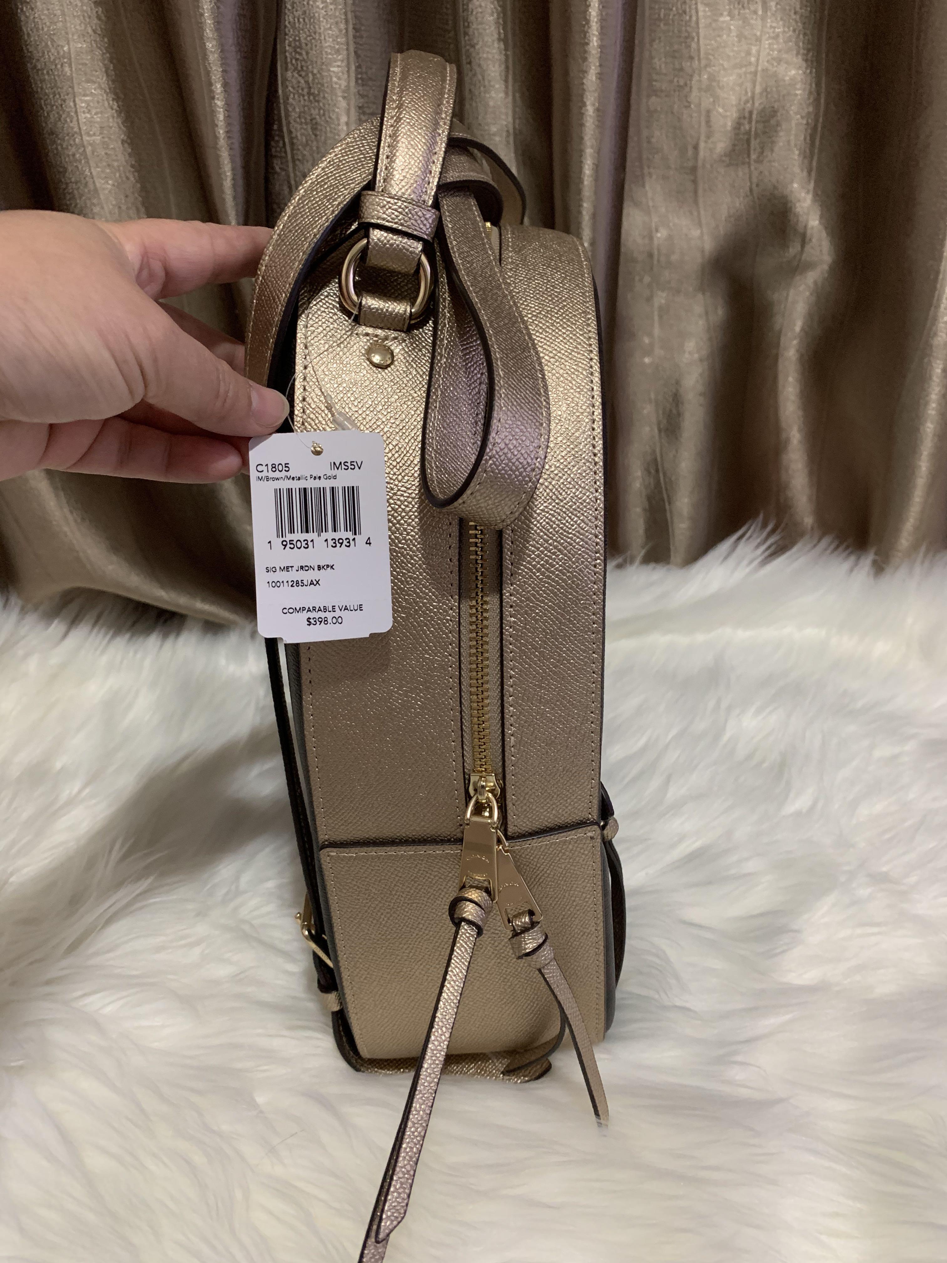 Gold best sale coach backpack