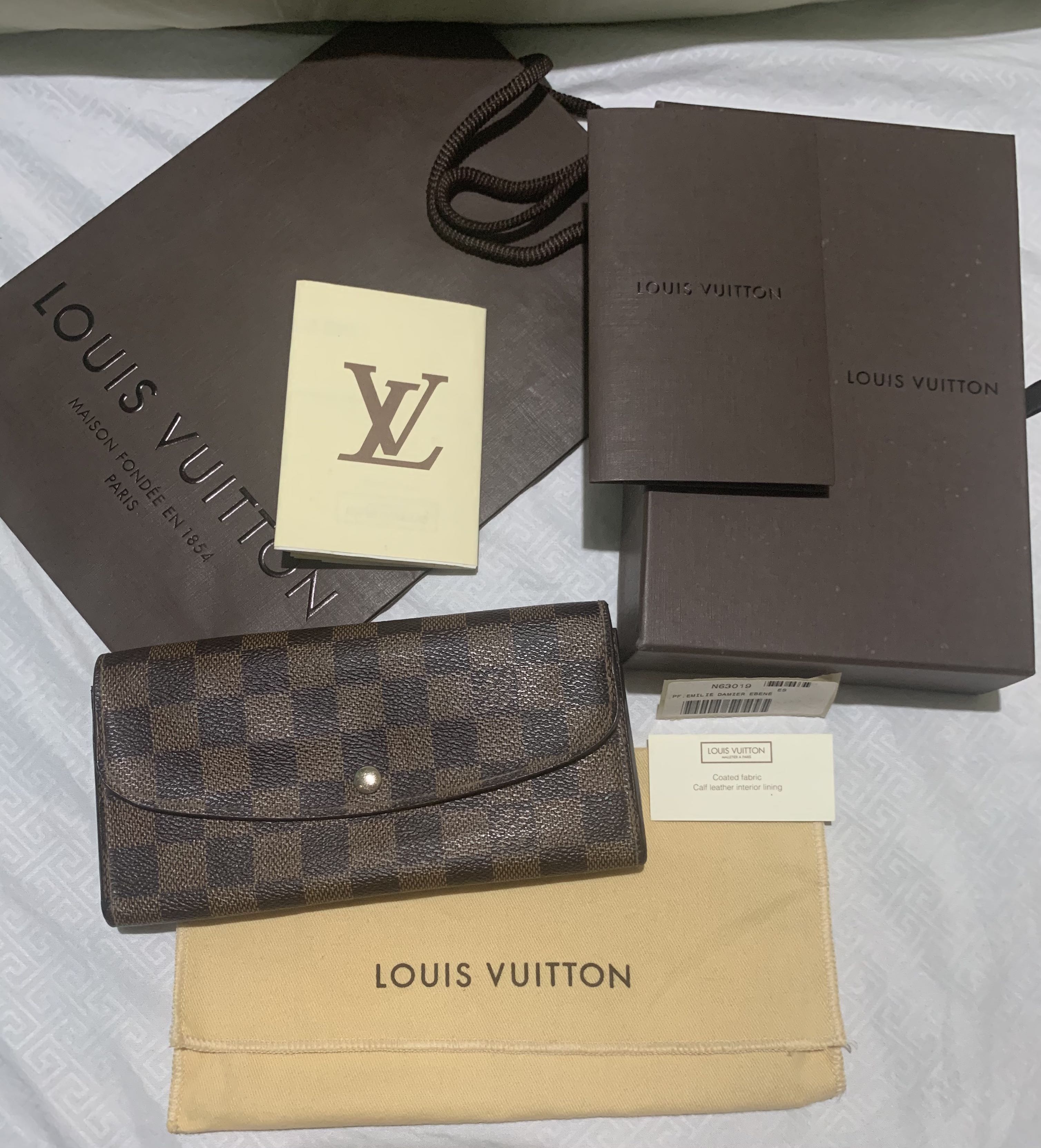 Louis Vuitton Emilie wallet. Which print & colour to choose? This one is  Damier Ebene canvas in Red. I bought my mom t…