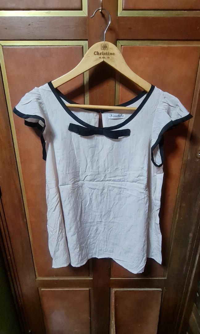 Sleeved Top with Bow (Category: Longsleeves) located in Pasig City. Submitted by xtnter (Listing ID 1071723058, Image 1). Description: Sorry ddnt iron my clothes 😁 just want to have a lil space in my cabinet. msg me if u want to know more bout the item. not really good on describing them.😊.