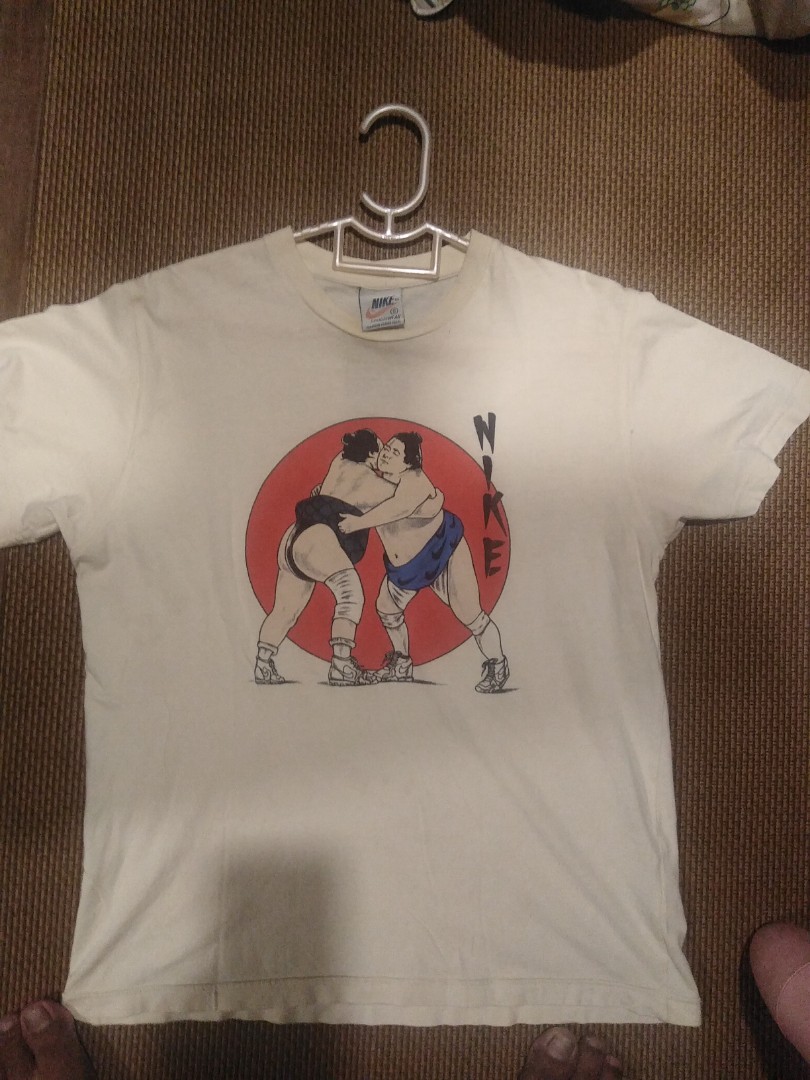 Nike sumo t shirt new arrivals