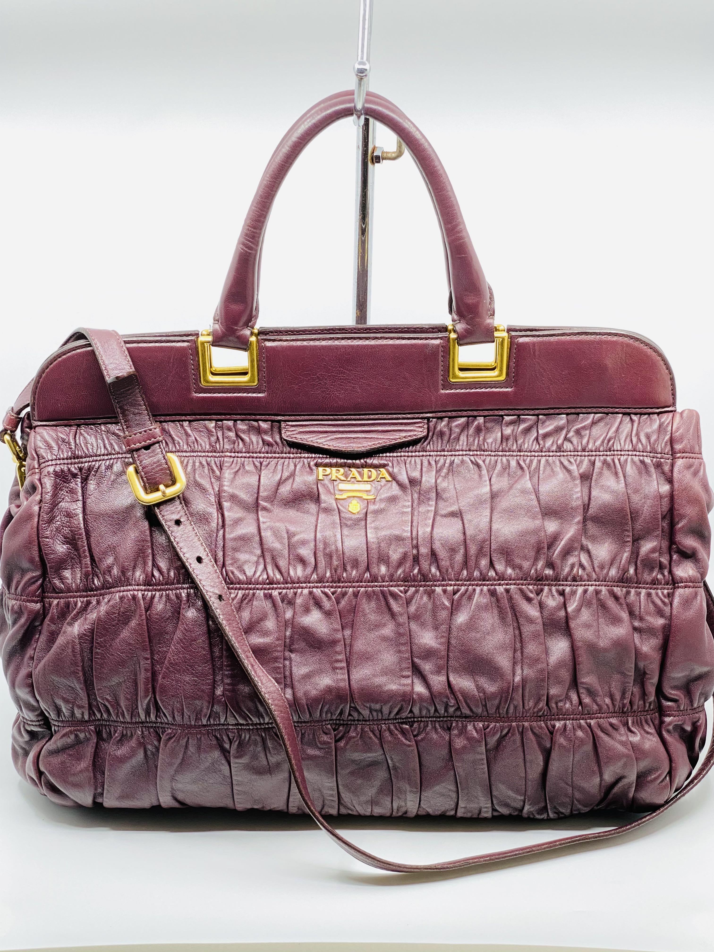 Authentic Prada nappa gauffre in wine color (Category: Luxury Bags & Wallets) located in Manila. Submitted by 2ndchancesale (Listing ID 1071151164, Image 1). Description: Preowned with strap No other inclusions 24k open for layaway 22k cash .