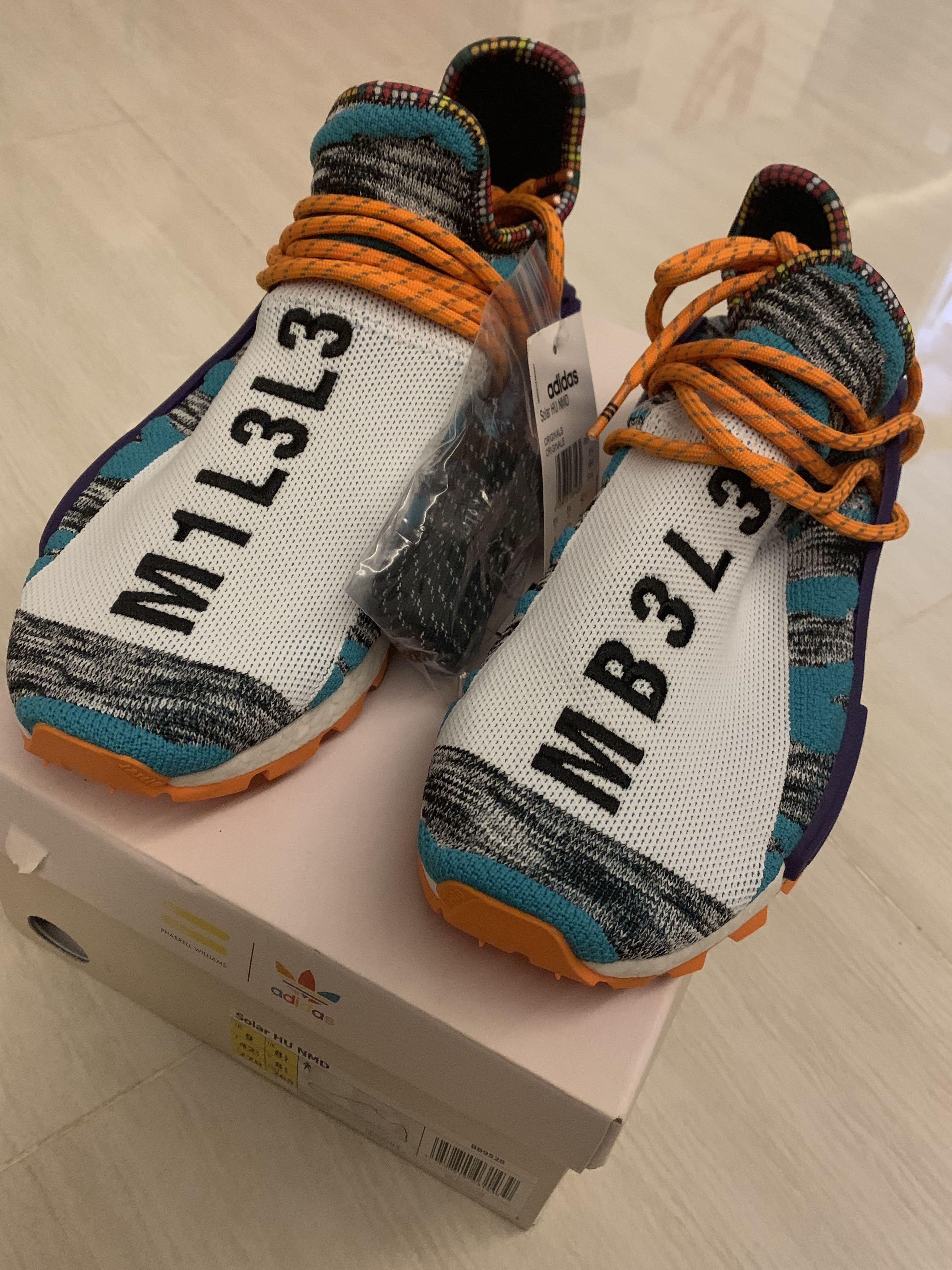 Pharrell x Adidas Hu NMD yeezy US9 off white Men s Fashion Footwear Sneakers on Carousell
