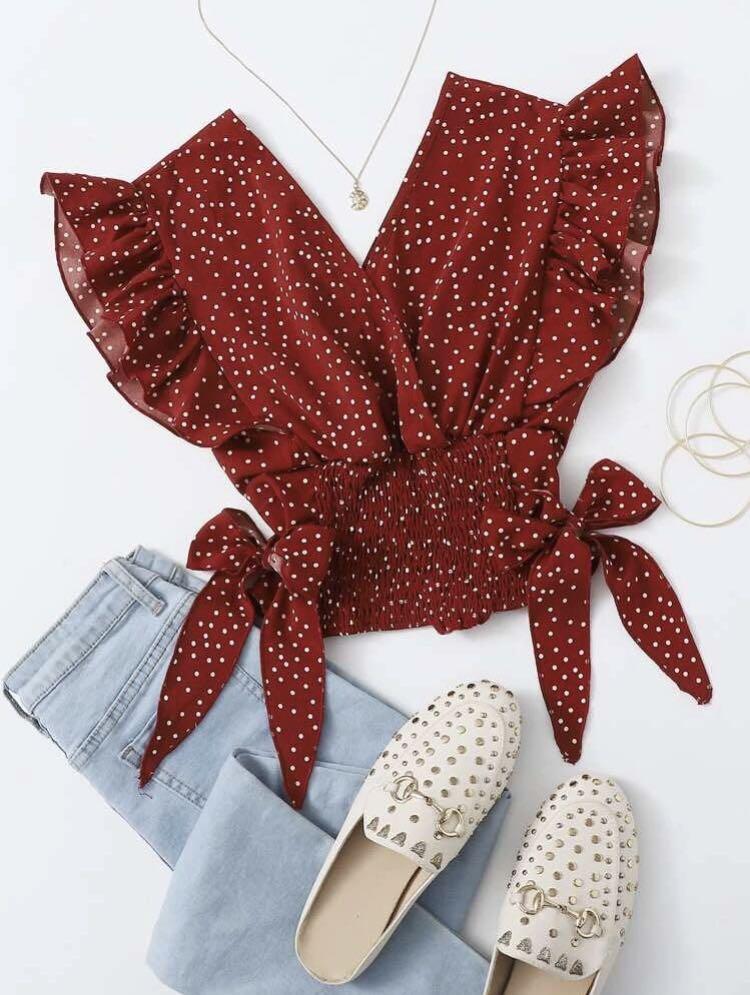 red blouse with white polka dots