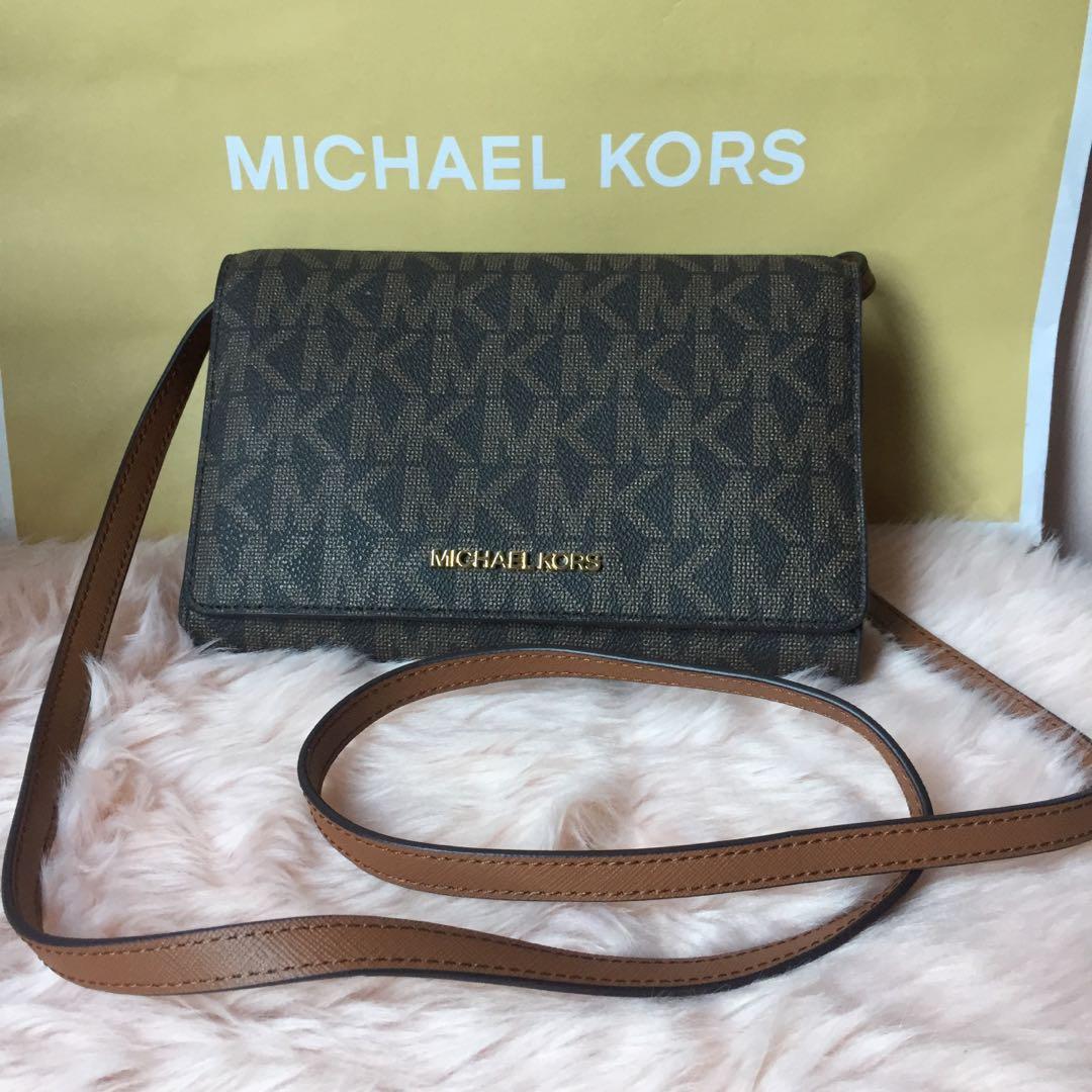 Michael Kors Sling Wallet, Luxury, Bags & Wallets on Carousell