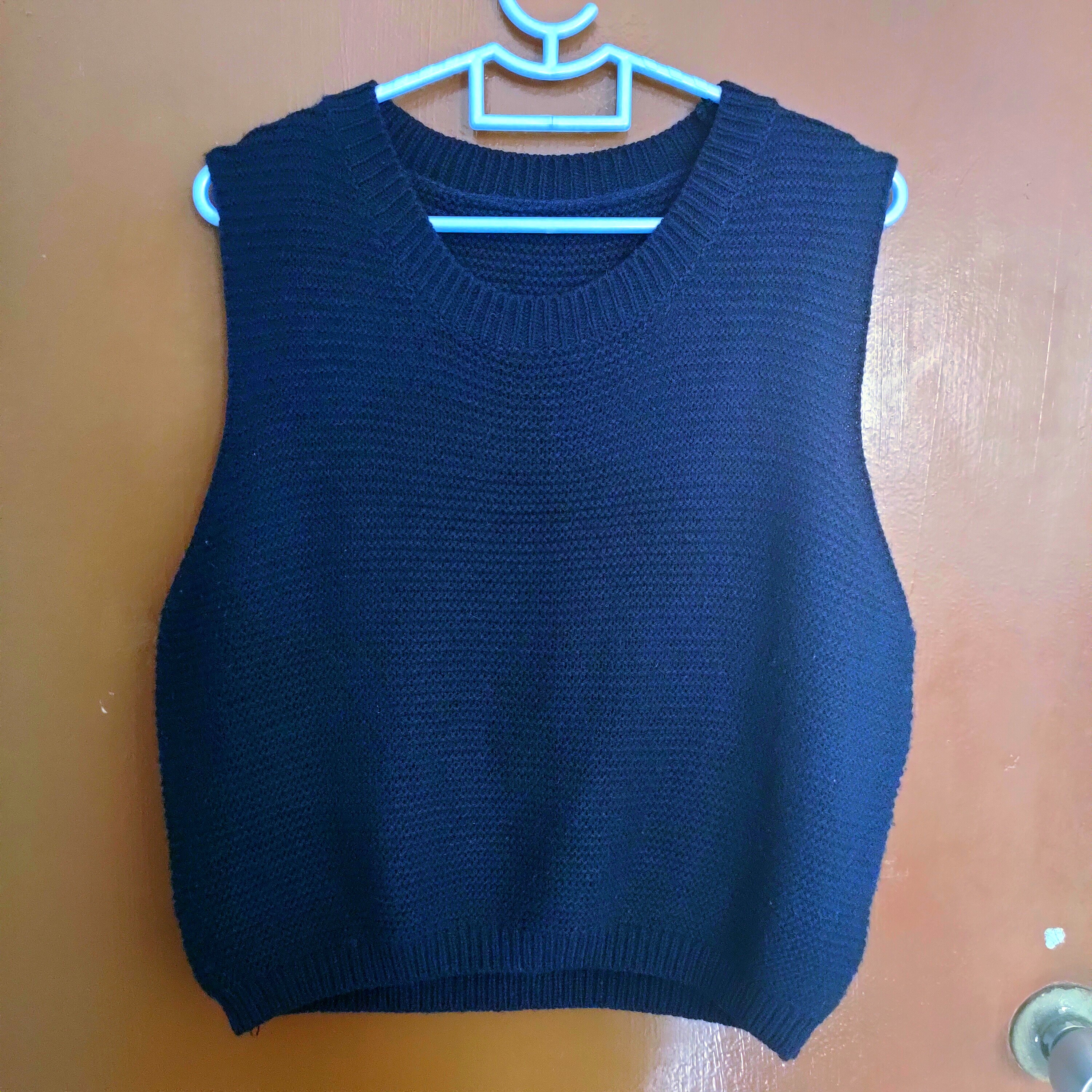 blue knitted vest