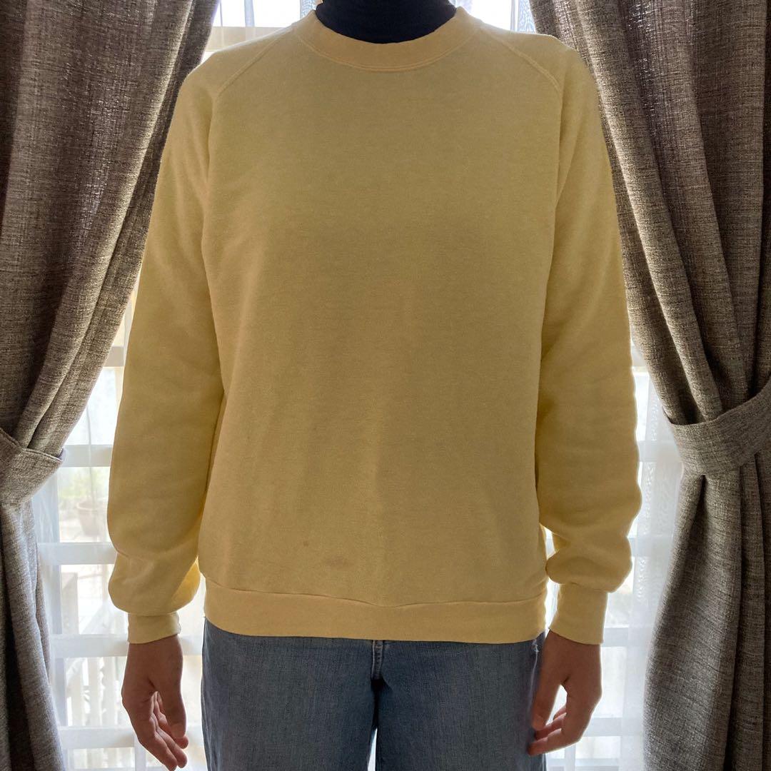 pastel yellow sweatshirt