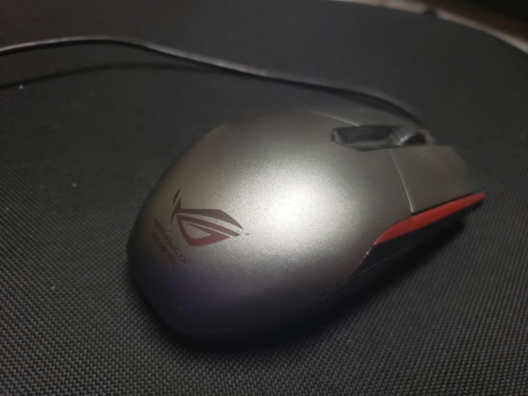 Asus ROG Sica gaming mouse (Category: Mouse & Mousepads) located in Quezon City. Submitted by fatal1ty6688 (Listing ID 1067323106, Image 2). Description: Used. Spare mouse. NO double clicks whatsoever, scroll wheel works fine. Bright pulsating led logo. Signs of use. This was from a laptop bundle. https://rog.asus.com/mice-mouse-pads/mice/ambidextrous/rog-sica-model/.