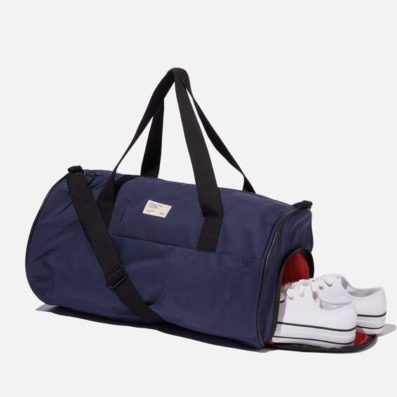 Typo canvas barrel bag store