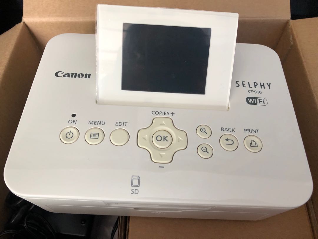 Canon Selphy CP910 (with paper set and ink), 攝影器材, 攝影配件, 腳架- Carousell