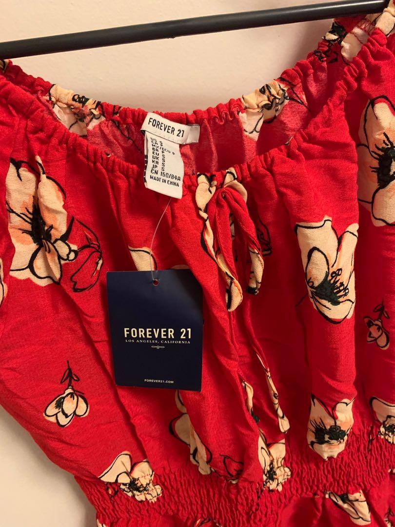 Forever 21 floral dress (Category: Dresses) located in Manila. Submitted by wandermum (Listing ID 1067284361, Image 2). Description: Fits S-M No stain No damage.