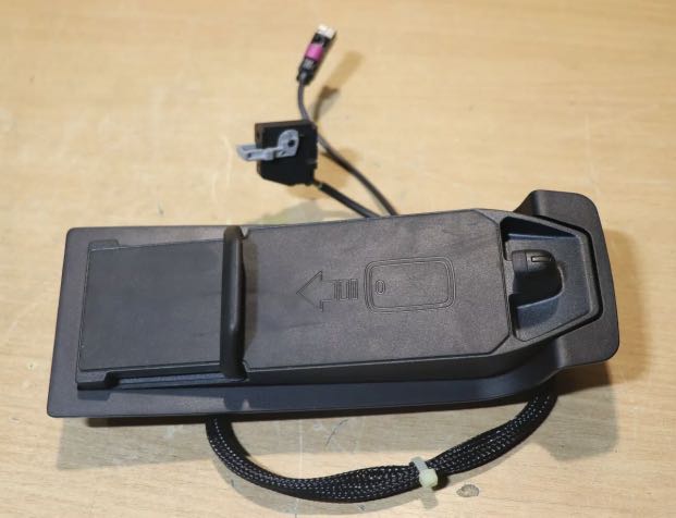 Mini armrest outlet wireless charger