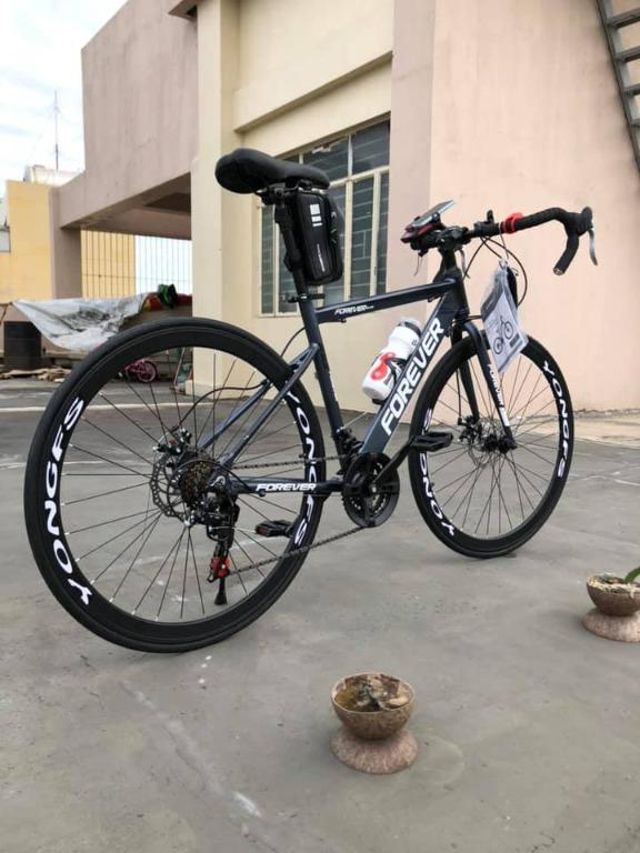 Forever road bike price sales