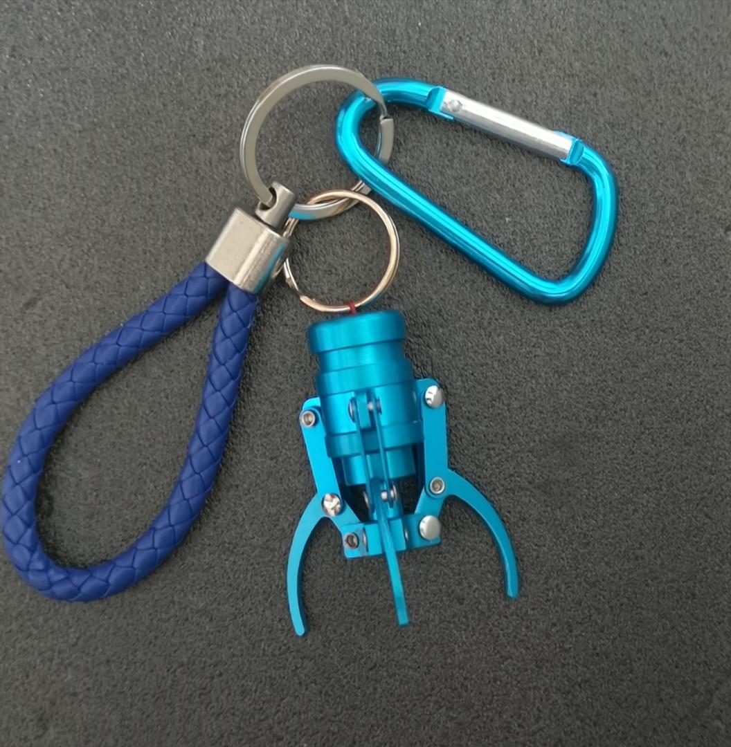 Mini Claw Keychains (Category: Other Merchandise) located in Singapore. Submitted by zr (Listing ID 1067390449, Image 1). Description: Brand New Mini Claw Machine Claw keychains Selling each for $16. Get 2 or more for $15 each. Available colours Blue x 1 Pink x 2 Gold x 1 Additional $2 for mailing or self collect at Phoenix LRT Station..