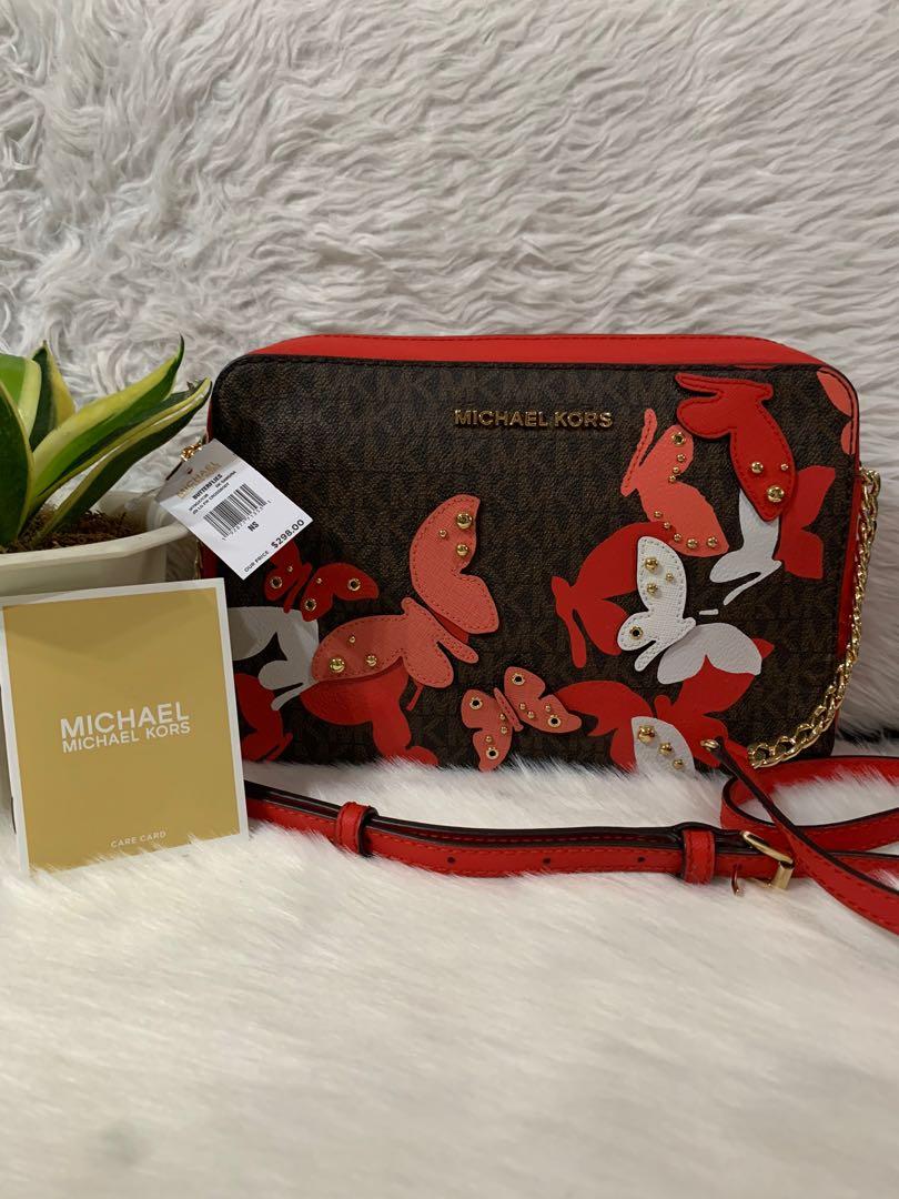 Michael Kors Butterfly Appliqués Crossbody Bag, Luxury, Bags & Wallets on  Carousell