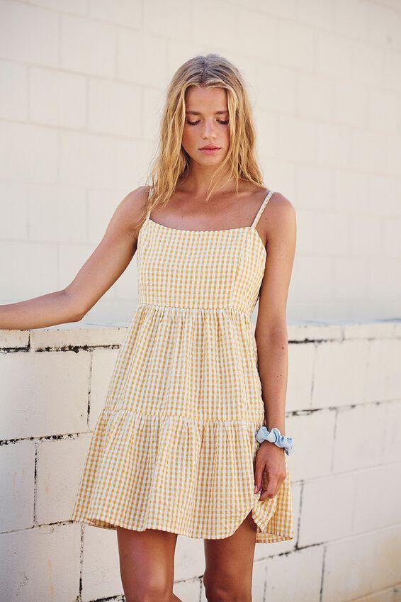 Yellow gingham mini dress on sale