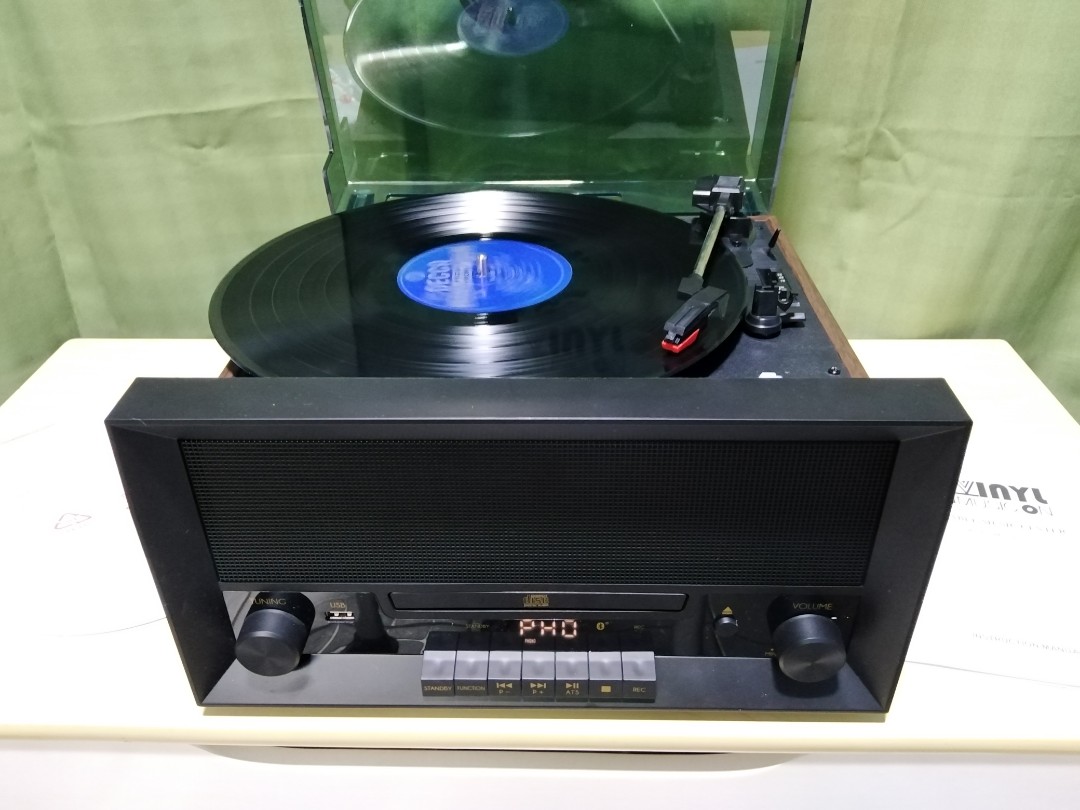 Vinyl Music On Turntable CD Bluetooth FM Radio USB and Vinyl Record