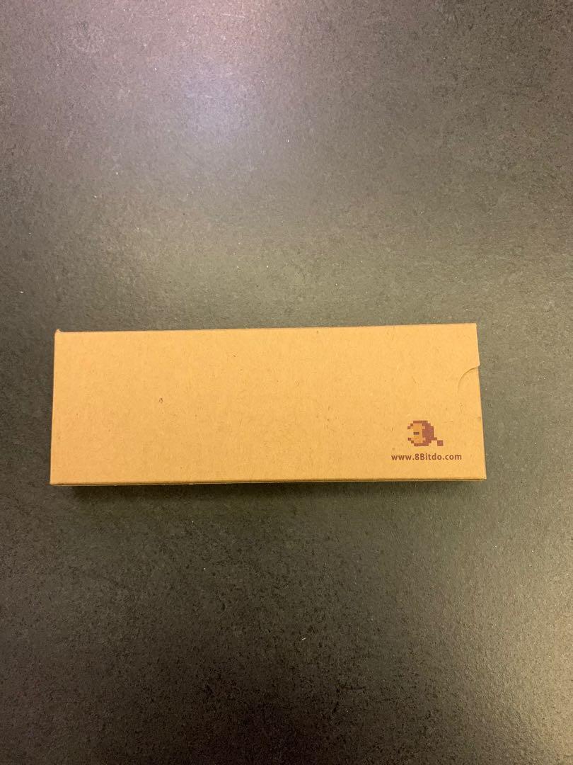 8bitdo Keychain (Category: Religious Items) located in Singapore. Submitted by nsw.blues.9 (Listing ID 1068170737, Image 3). Description: - Brand new sealed. See pics - Comes with box packaging Retro controller SNES keychain Tags: key, chain.