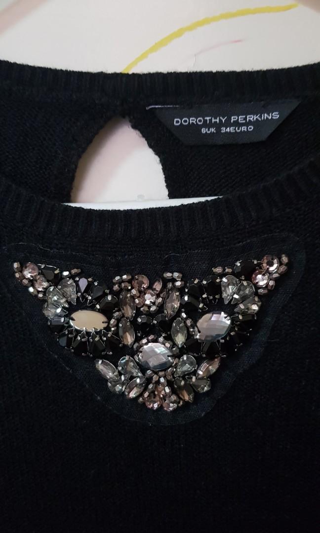Dorothy Perkins black dress (Category: Dresses) located in Quezon City. Submitted by bons83 (Listing ID 1068023863, Image 3). Description: worn once almost new stretch knitted fabric fits small to medium.