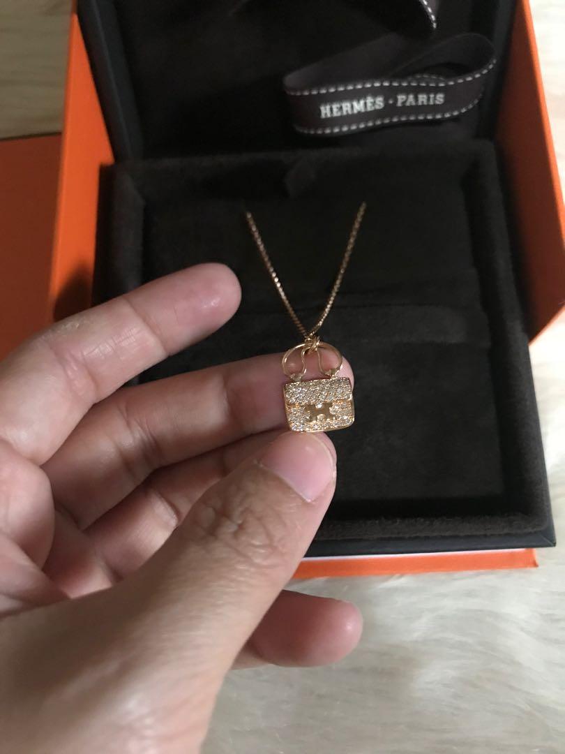 Hermes Constance necklace (Category: Luxury Accessories) located in Makati City. Submitted by myterry1941 (Listing ID 1068145594, Image 3). Description: Used 2x only Hermes Constance amulet necklace With diamonds 18k Rose gold Complete with box and certificate .