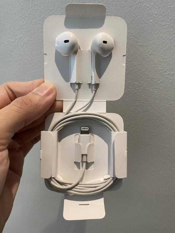 iPhone Earphones (Category: Earphones) located in Quezon City. Submitted by amgesca (Listing ID 1068055123, Image 1). Description: Slightly bitten by my dog but working 100% great! iPhone earphones no issues..