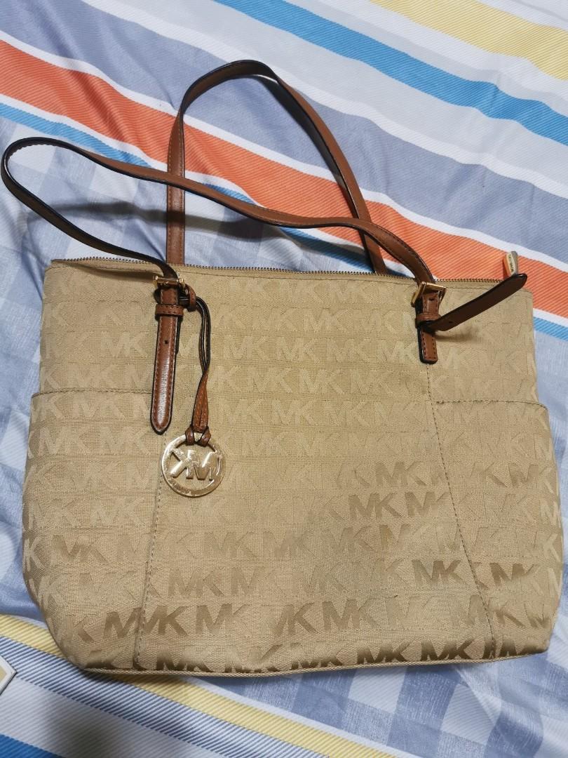 Original Michael Kors Bag with Leather straps (Category: Purses & Pouches) located in Antipolo. Submitted by G3AAA (Listing ID 1068016932, Image 2). Description: Used this only 2x. Very good condition no flaws. Good as new. RFS is to free up closet space..