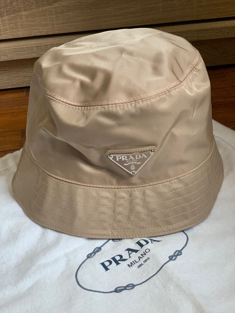 PRADA almost new beige bucket hat, Women's Fashion, Watches & Accessories,  Hats & Beanies on Carousell