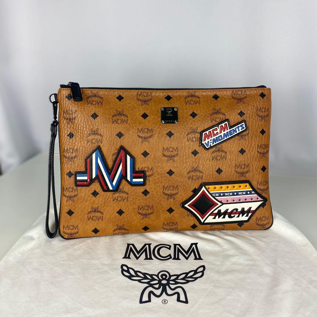 Authentic MCM X Victory Patch Clutch Bag