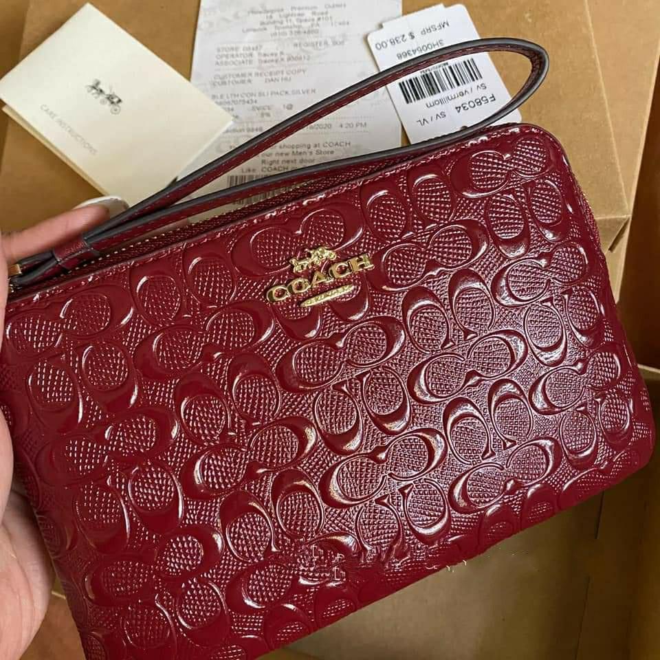 Maroon coach wallet clearance