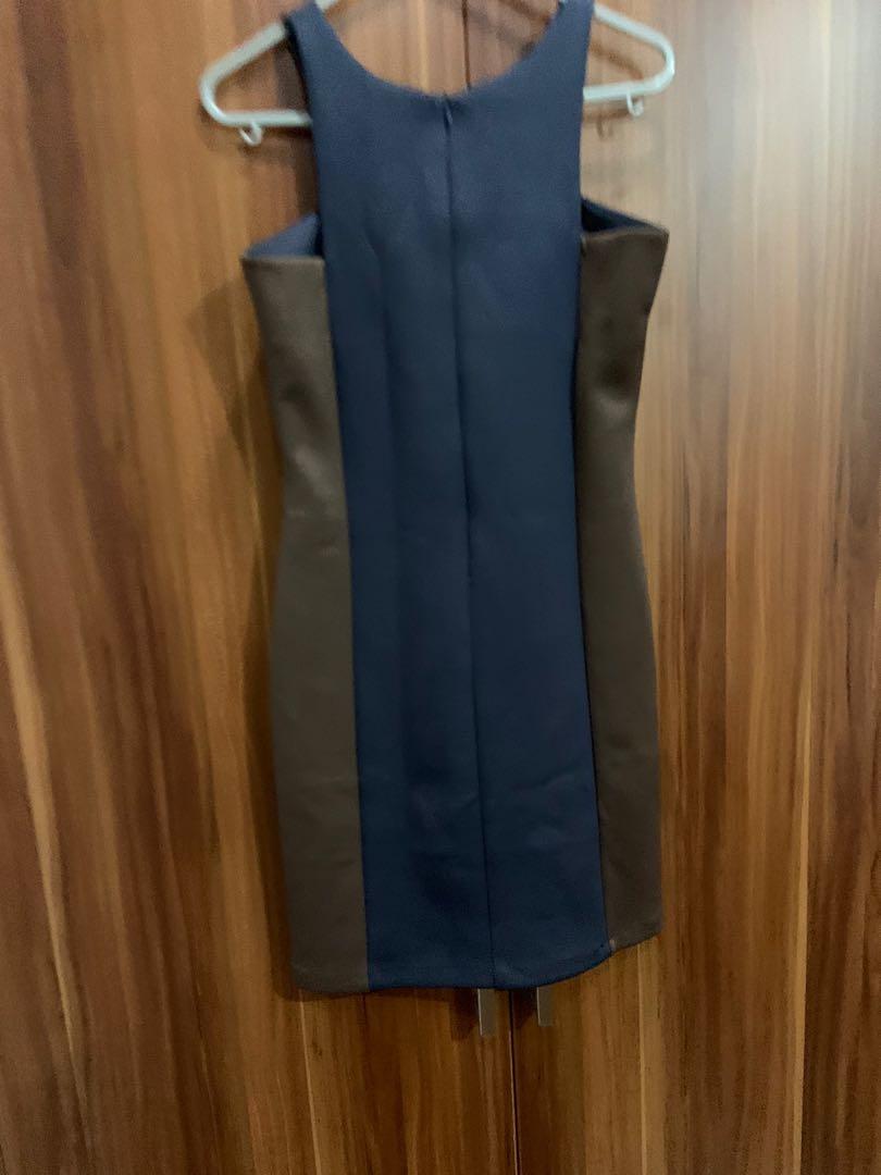 Folded & Hung Dress (Category: Dresses) located in Manila. Submitted by hflores_23 (Listing ID 1068382625, Image 2). Description: Dress na pwede pang-office pwede din pang-gimik. I had this in my closet a long time na. But not used often. The zipper at the back has some flaws. Natastas sa may dulo, but zipper still works. Just needs to sew the hems..