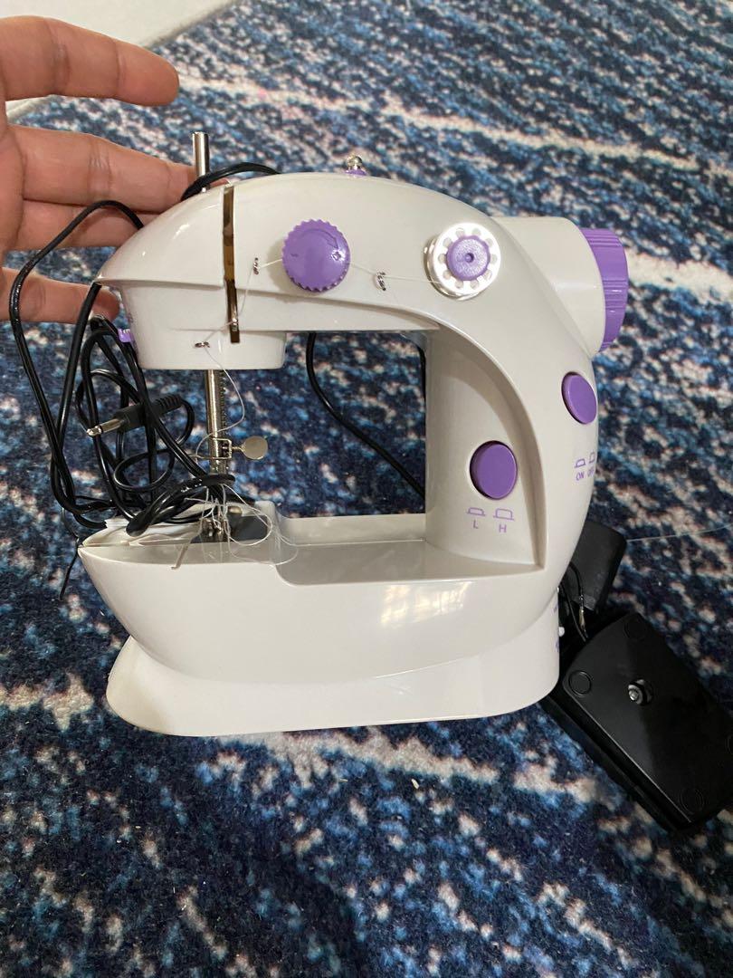 Mini Sewing Machine (Category: Handmade Craft) located in Singapore. Submitted by donrozarito (Listing ID 1068308280, Image 4). Description: Barely used. Condition is still good. Ideal for beginners. Small size and easy storage. Comes with foot pedal for easy control. .