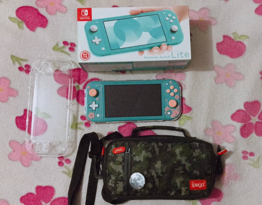 [RUSH SELLING] Nintendo Switch Lite Turquoise with one year nintendo