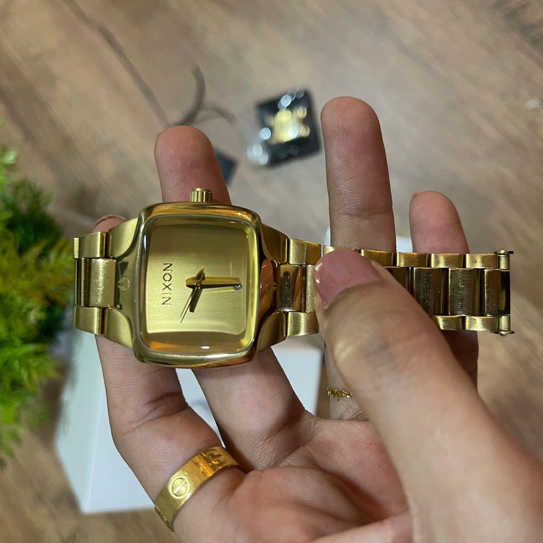 Nixon big store gold watch
