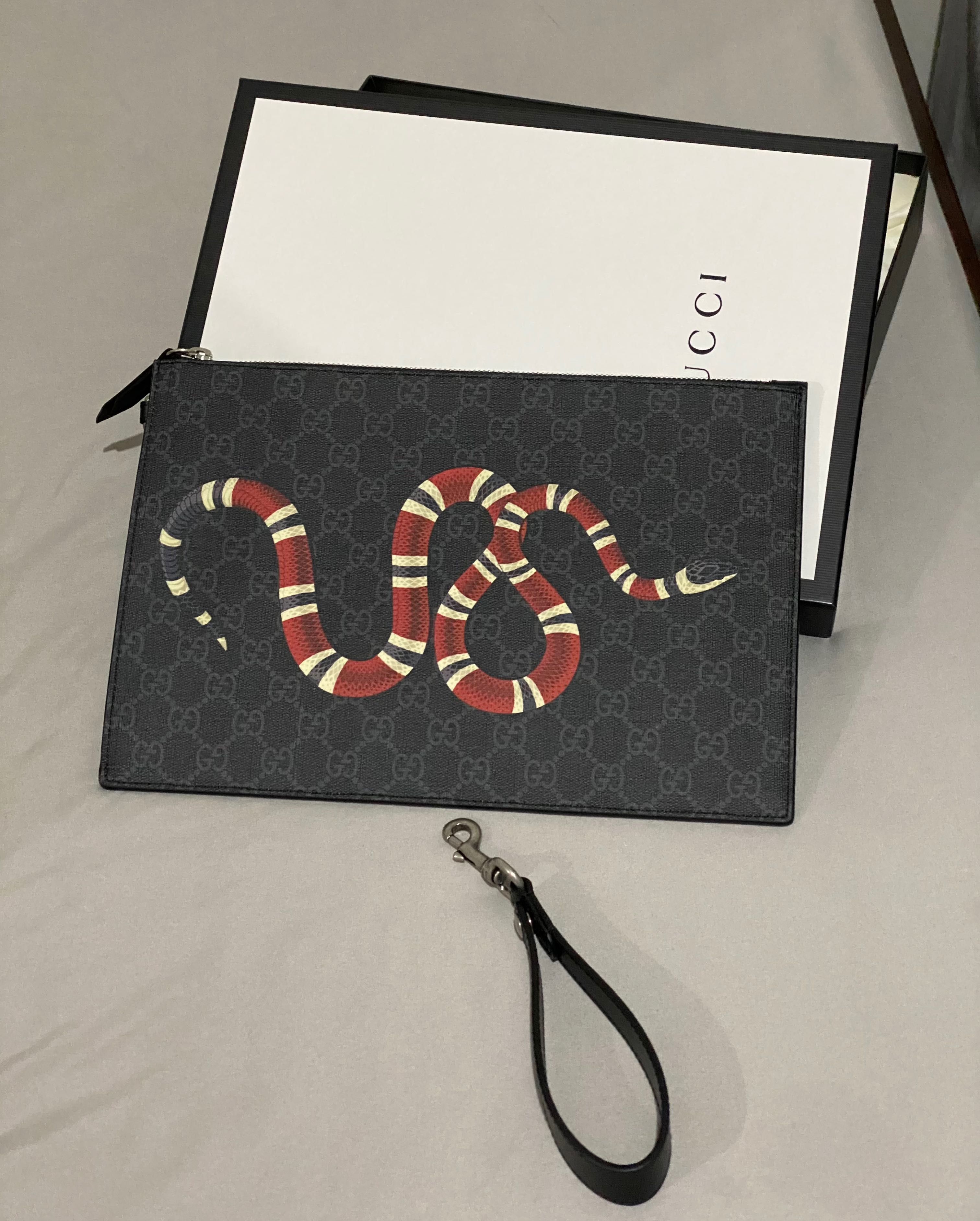 Gucci snake pouch hot sale
