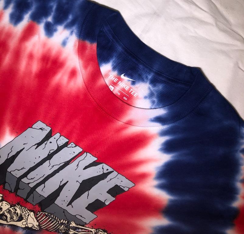 Blue and store red nike shirt