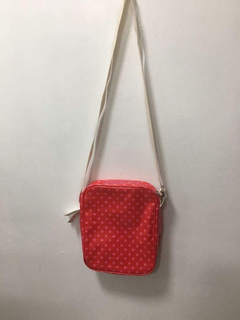 Authentic Cath Kidston sling bag (Category: Purses & Pouches) located in Iloilo. Submitted by genblue (Listing ID 1072412455, Image 3). Description: 📌 Authentic Cath Kidston sling bag 📌new with tag 📌bought in the UK 📌tiny stain on the label n.b. All items listed as authentic are guaranteed original unless stated otherwise.🌺 MOP: BPI/Gcash/COD ✈️shipping fee c/o buyer.