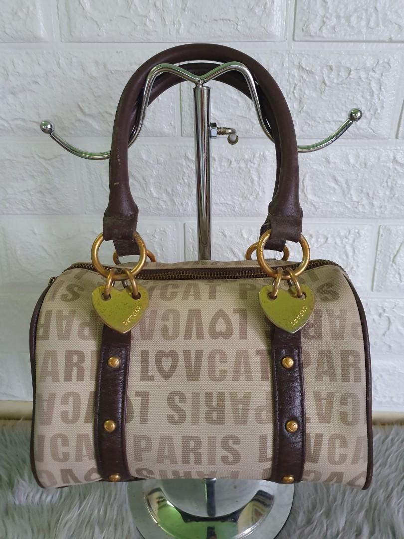 Lov Cat Small Papillon Bag (Category: Purses & Pouches) located in Tabaco. Submitted by etceterashop (Listing ID 1072392444, Image 1). Description: Lov Cat Small Papillon Bag Size: Small Good used condition (a bit faded) Please send me a PM for inquiry Bags are from Korea and Japan.