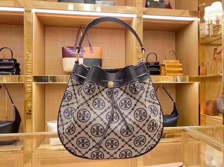 NWT) TORY BURCH - T MONOGRAM JACQUARD DRAWSTRING HOBO 80506, Luxury, Bags &  Wallets on Carousell