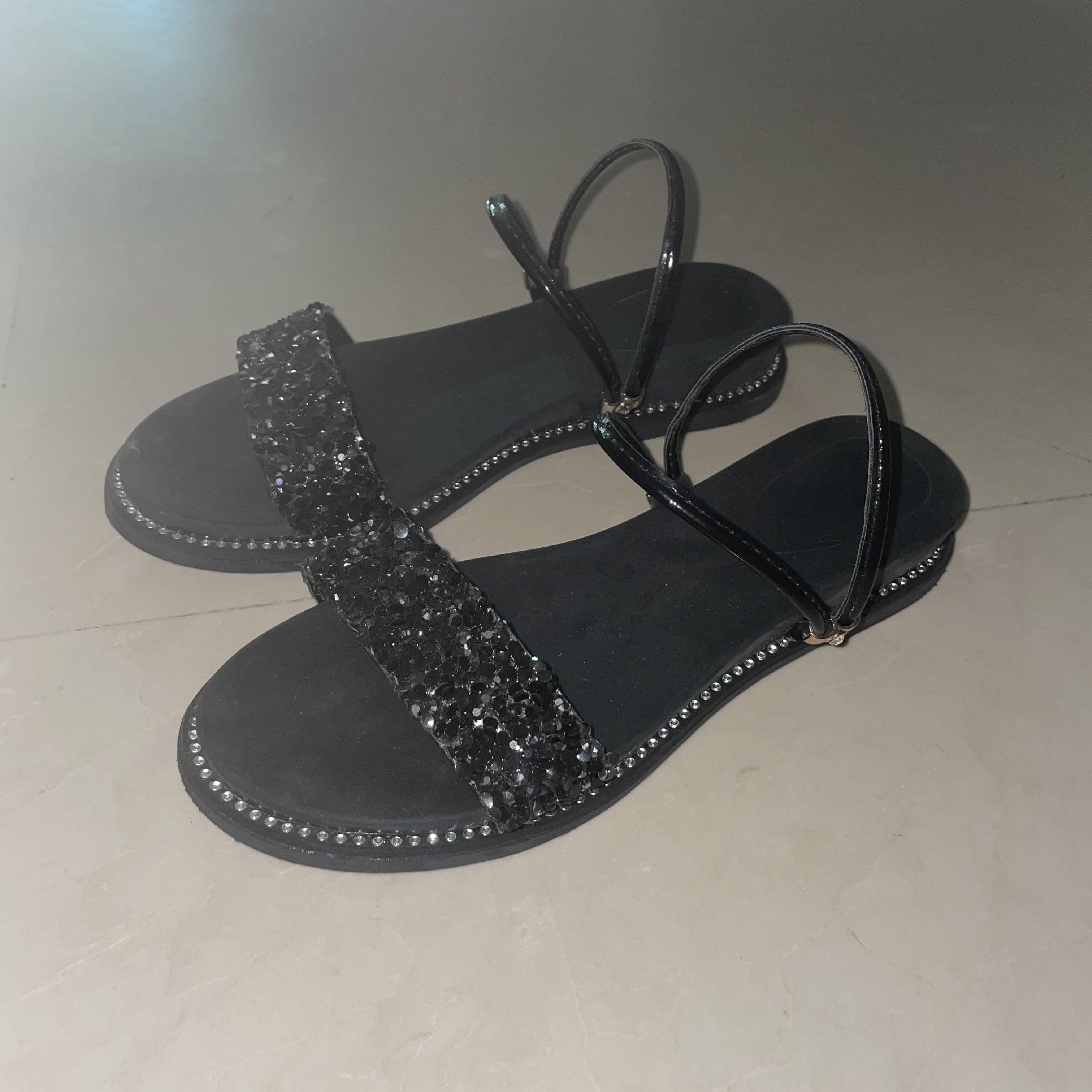 black strappy flip flops