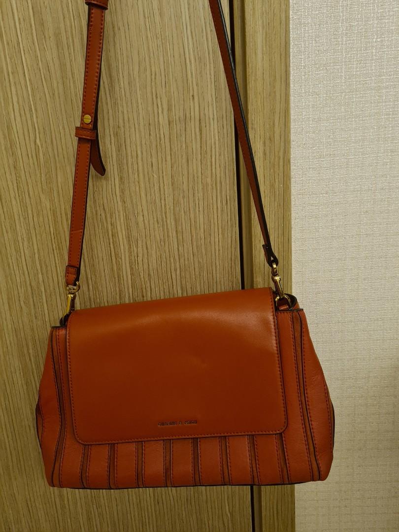 charles and keith orange sling bolsa