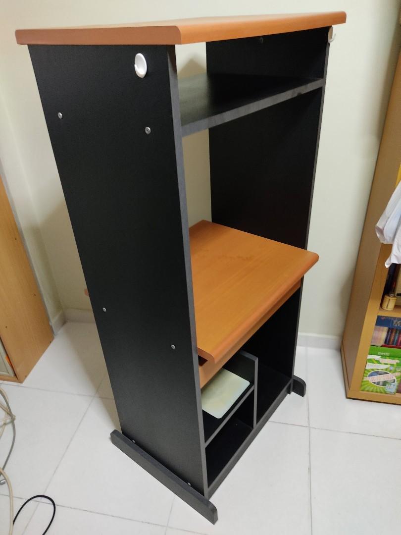 Computer table (Category: Tables & Sets) located in Singapore. Submitted by devotar (Listing ID 1074454246, Image 2). Description: solid wood computer table weight about 15kg bought at $799 some years back, selling due to new monitor cannot fit in. NO warranty. height 135cm monitor space L55.5cm H48cm Depth 48cm CPU space L27cm H45cm Depth 38cm cash and carry self collect at playground of block 609 ANG MO KIO S560609 NO delivery service as it is 