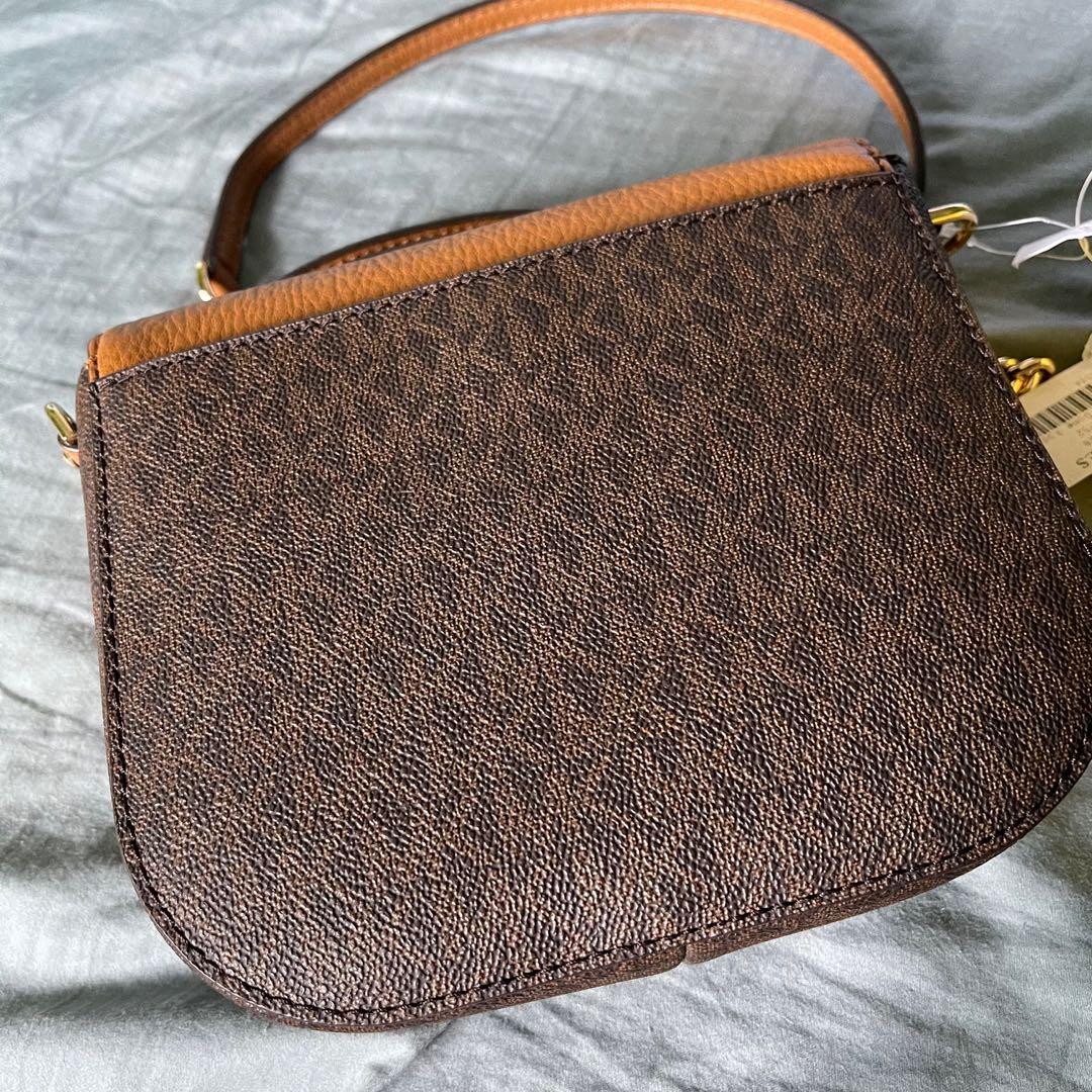 Michael kors half best sale dome crossbody acorn