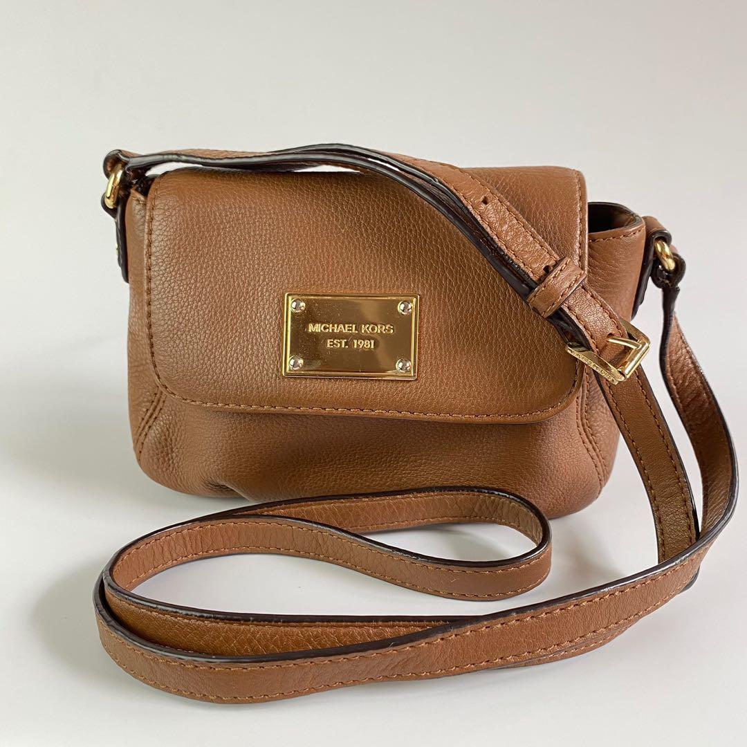 MK mini sling bag, Women's Fashion, Bags & Wallets, Cross-body Bags on  Carousell