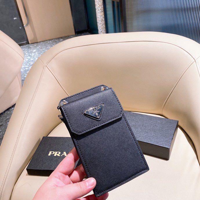 Prada mini slingbag ( preorder japan 🇯🇵) (Category: Luxury Bags & Wallets) located in Angeles City. Submitted by lux.finds (Listing ID 1074752658, Image 2). Description: .