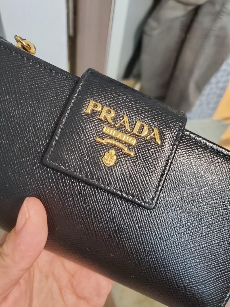 Prada saffiano metal medium flap wallet hot sale