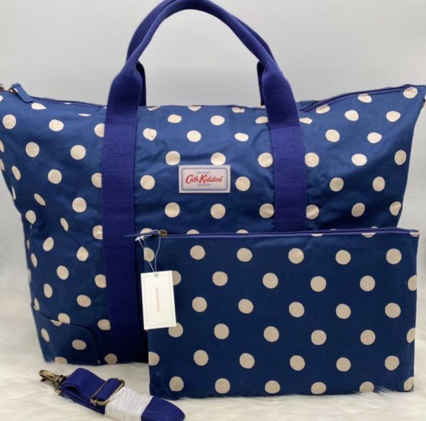 Button spot foldaway overnight bag hot sale