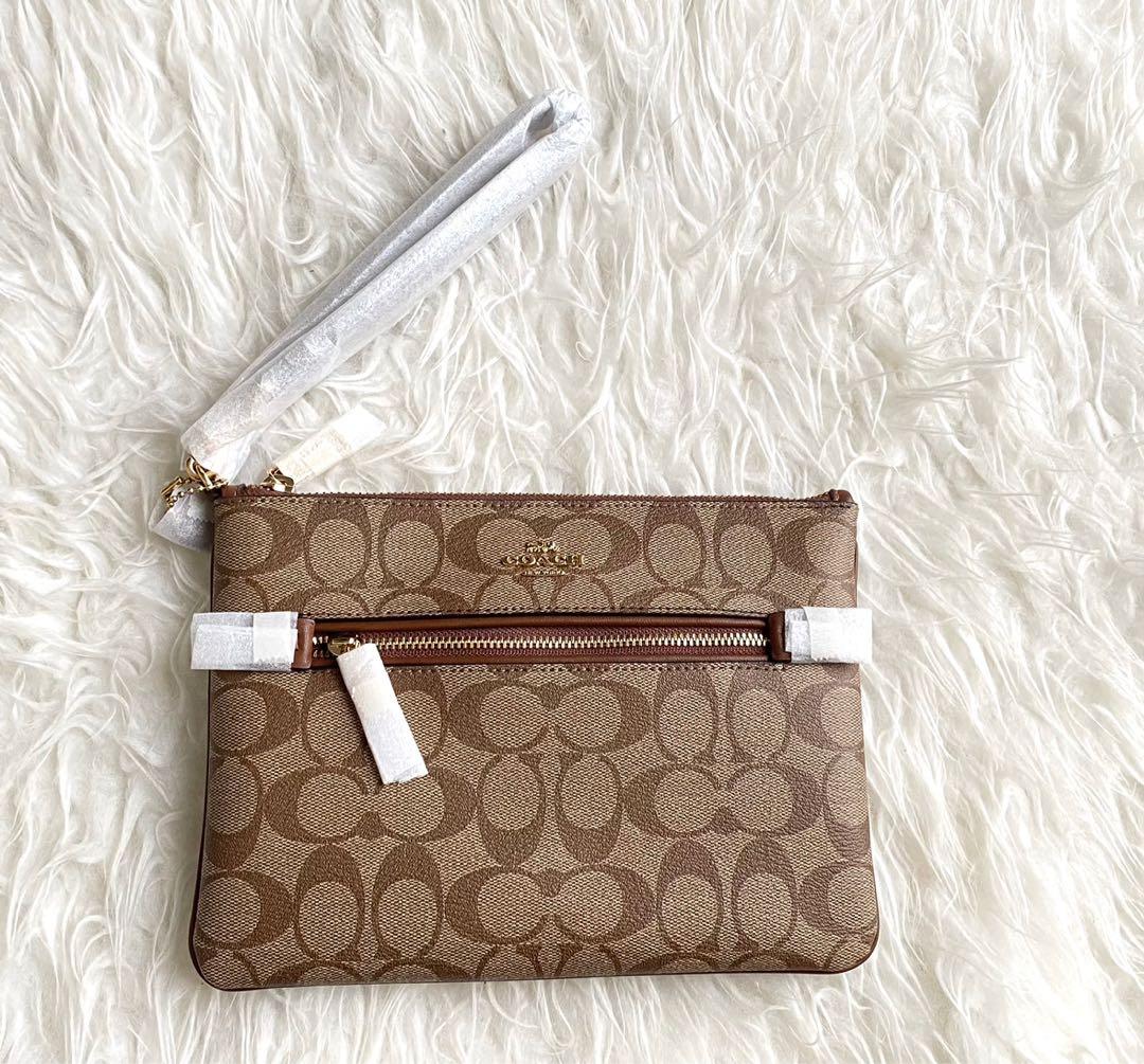 Coach gallery pouch in signature canvas new arrivals